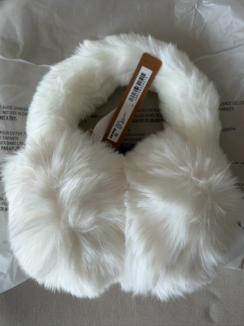 SKIMS Cream Faux Fur Ear Warmers